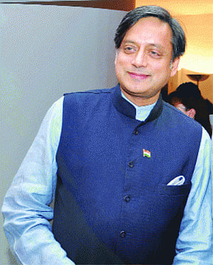 Day after Cong chief's rebuke,  Tharoor earns PM's accolades