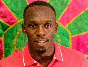 Bolt storms to 100m victory, Farah wins 3,000m