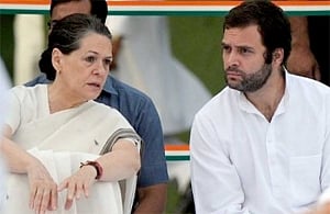 led by Sonia, Cong MPs sit on dharna in Parliament complex