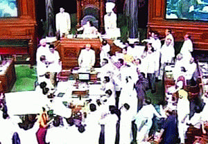 lS adjourned as Cong MPs throw papers at Chair