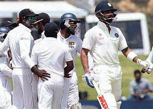 Herath claims seven, India lose first Test by 63 runs