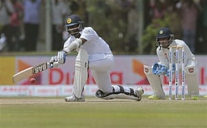 Sri lanka bowled out for 306 in reply to India's 393