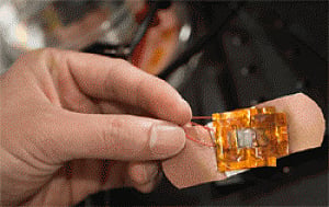 Stretchy, wearable device to monitor heart functioning