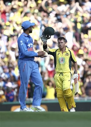 Marsh, Warner slam tons as Australia score 330/7