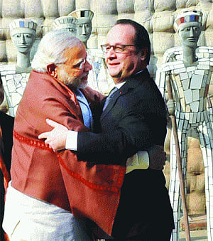 India, France get down to business, ink 16 pacts