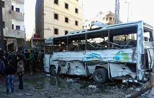Islamic State bombings near Syria Shiite shrine kill 71