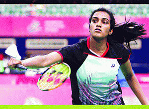 Indian shuttlers enter QF in style