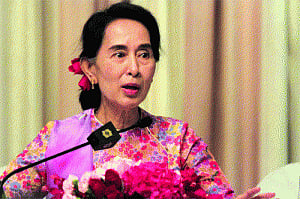 Suu's vow to be above State Head real! Prez  post to go to ex-driver