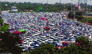 light showers, rally bring traffic to grinding halt