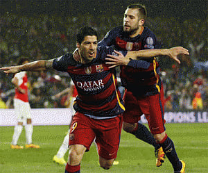 Champions league: Barca beat Arsenal to reach last eight