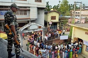 Amid reports of violence, 20% polling in Bengal,  15% in Assam