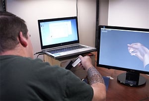 'Smart' device helps paralysed man swipe credit card