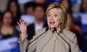 Clinton cites effort in getting India, China commit to GHG cut