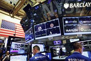 US stocks end lower on oil slide, soft data