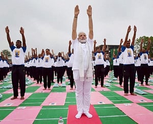 Yoga no religious activity, a global mass movement: Modi