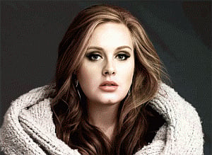 Adele burps while taking selfie with fan onstage