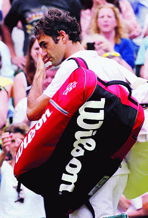 Master vows to be back at Wimbledon