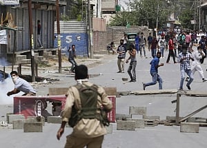 Curfew remains in force, toll in Kashmir violence climbs to 34