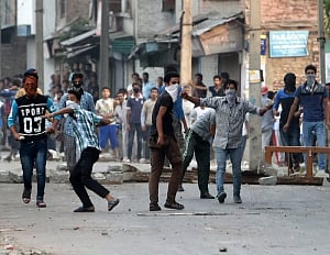 Curfew remains in force in Kashmir Valley, ruling MlA injured
