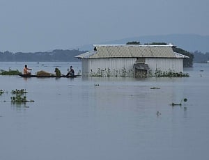Rajnath in Assam, conducts aerial survey of flood hit areas
