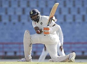 Ashwin-Saha lead India's recovery on opening day