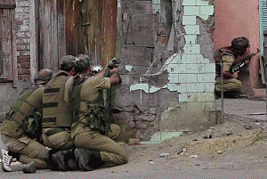 CRPF officer, two militants killed in Srinagar