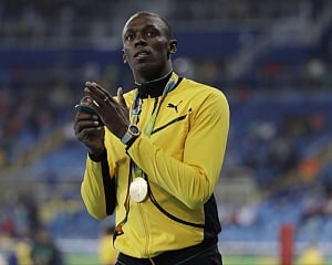 'Ageing' Bolt takes second Rio gold