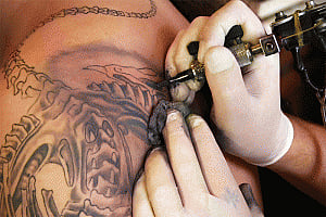 Getting tattoos in unhygienic setting ups infection risk