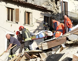 Italy toll quake climbs: at least 18 dead