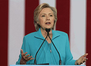 Clinton lead reduced to half nationally; ahead in key states