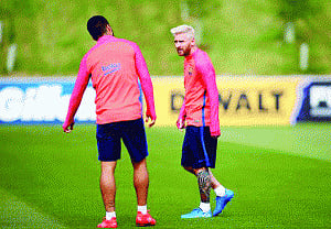 Messi back in Barca training