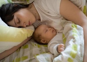 Sleeping beside your baby can cause cot death