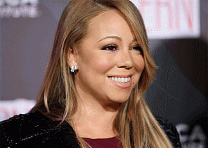Carey's fiance upset by her friendship with dancer