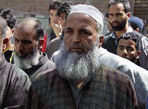 Burhan Wani's father condemns burning schools in Kashmir