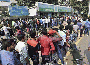 Serpentine queues outside banks, ATMs on Sunday