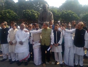 Opposition unites against PM at Parliament's Gandhi statue