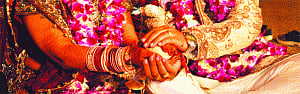 Cash crunch ties prospective couples into knots