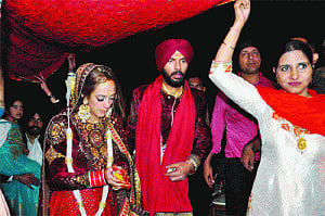 Yuvraj, Hazel Keech walk down the aisle