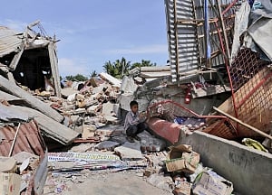 Indonesia quake toll jumps to 97 as more bodies found