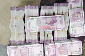 Over Rs 6 cr cash, 32 kg gold haul in Karnataka town