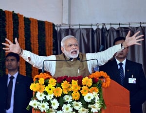 After corruption charge, Modi mocks at Rahul
