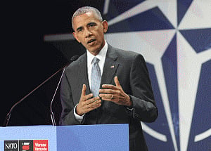 Obama signs $618bn def bill; boosts security coop with India