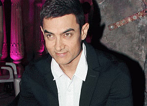 Kiran a good singer, says Aamir