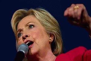 Clinton calls on Trump to speak up on Kansas shooting