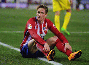 Atletico's Torres suffers 'traumatic brain injury'
