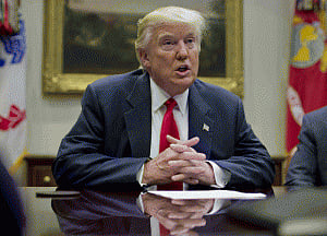 Trump expected to sign revised travel ban tomorrow: US media