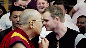 Smith relaxes after meeting the Dalai lama