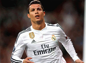 Ronaldo hat-trick fires Real into semis