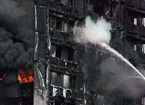 london fire: baby dropped from 10th floor caught by man on ground
