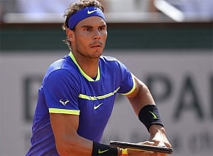 Nadal advances to fourth round at Wimbledon